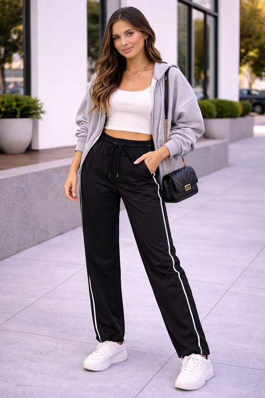 Pantalón deportivo negro con líneas laterales Marca BIBIANA SONJAYA Talla S Usado