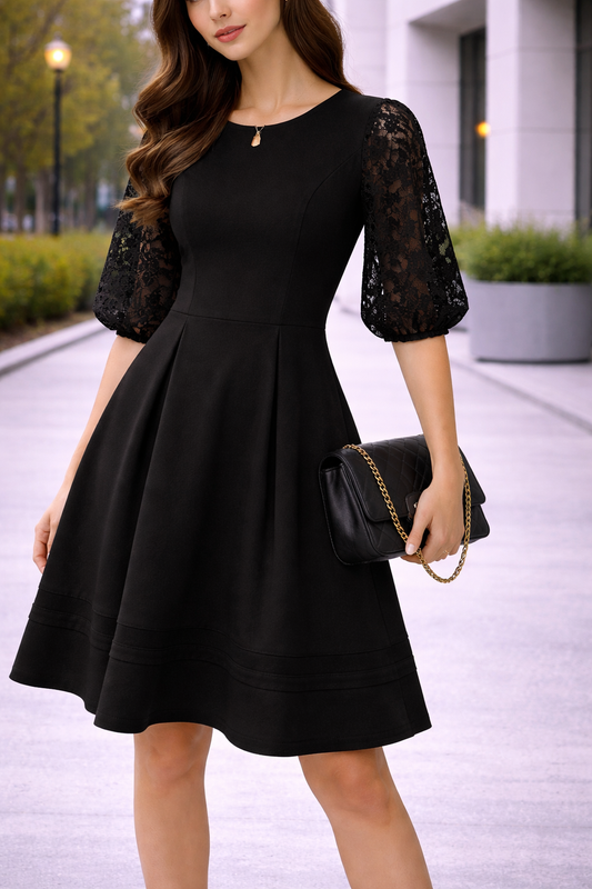Vestido negro elegante con mangas de encaje Marca Calvin Klein Talla 6 Usado