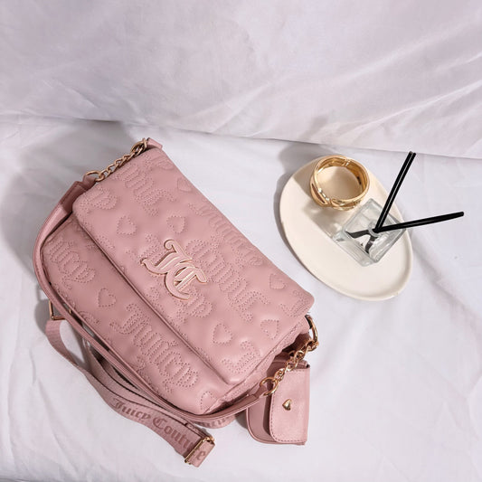 Cartera bandolera rosada Juicy Couture Nueva